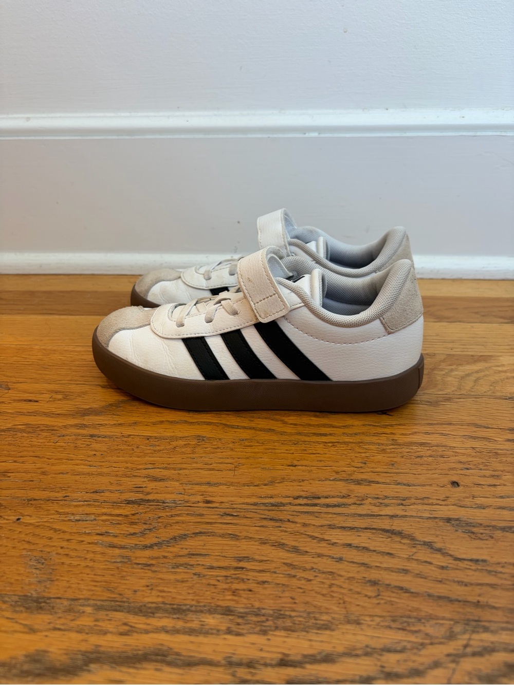 adidas Kids White and Black Stripe Sneakers with Brown Sole. Worn only once.